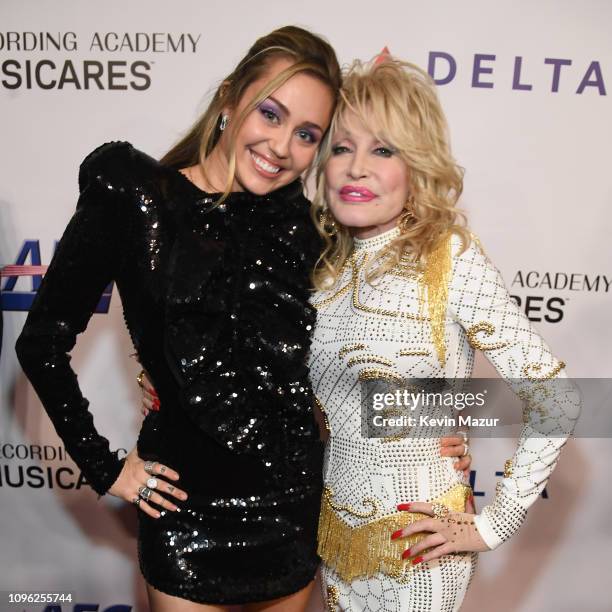 Miley Cyrus and Dolly Parton attend MusiCares Person of the Year honoring Dolly Parton at Los Angeles Convention Center on February 8, 2019 in Los...