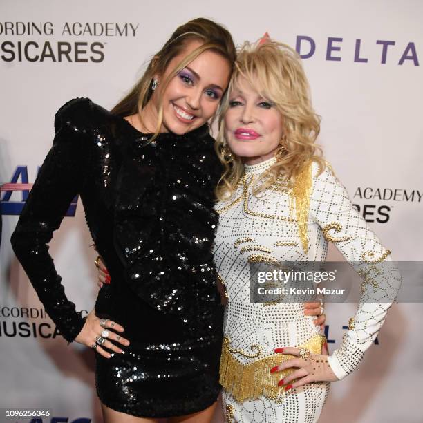 Miley Cyrus and Dolly Parton attend MusiCares Person of the Year honoring Dolly Parton at Los Angeles Convention Center on February 8, 2019 in Los...