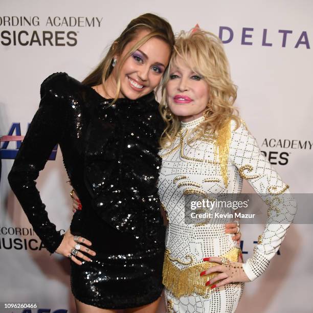 Miley Cyrus and Dolly Parton attend MusiCares Person of the Year honoring Dolly Parton at Los Angeles Convention Center on February 8, 2019 in Los...