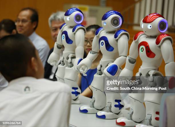Humanoid robots on display in a press conference led by The Chinese University of Hong Kong to release research findings on the effectiveness of...