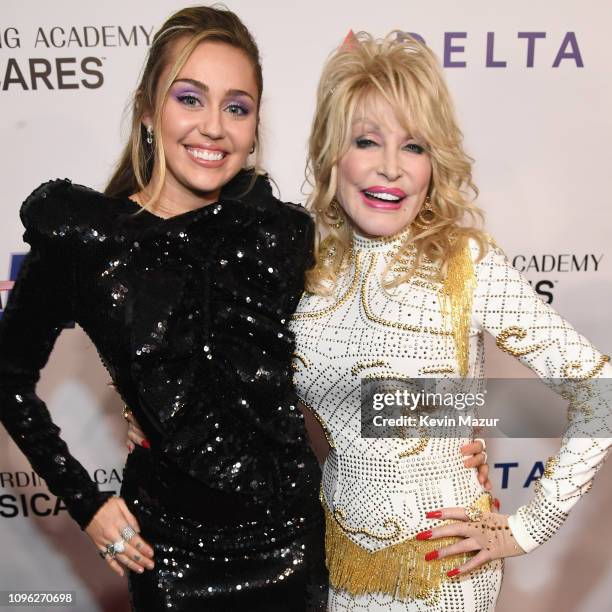 Miley Cyrus and Dolly Parton attend MusiCares Person of the Year honoring Dolly Parton at Los Angeles Convention Center on February 8, 2019 in Los...