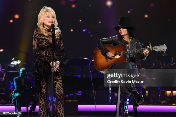 Dolly Parton and Linda Perry perform onstage MusiCares Person of the Year honoring Dolly Parton at Los Angeles Convention Center on February 8, 2019...