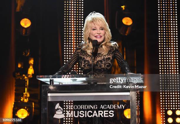 Dolly Parton accepts the MusiCares Person of the Year award onstage during MusiCares Person of the Year honoring Dolly Parton at Los Angeles...