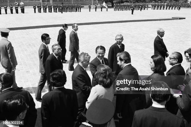 Romanian President Nicolae Ceausescu and his wife Elena attend their seeing off ceremony with Emperor Hirohito at the Akasaka State Guest House on...