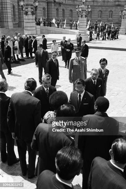 Romanian President Nicolae Ceausescu and his wife Elena attend their seeing off ceremony with Emperor Hirohito at the Akasaka State Guest House on...