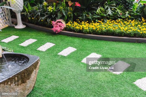 path in a garden - artificial grass stock pictures, royalty-free photos & images
