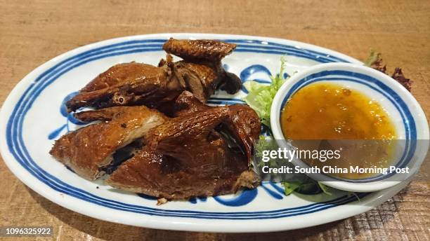 This image shows roast pigeon with apricot sauce by Miss Saigon, at 36 Forbes Street, Kennedy Town, Western District. 30AUG16 [16SEPTEMBER2016...