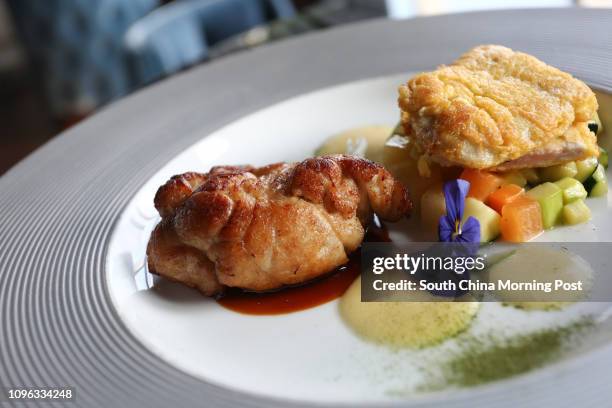 This image shows veal sweetbread and veal piccata with vegetables..., Photo d'actualité