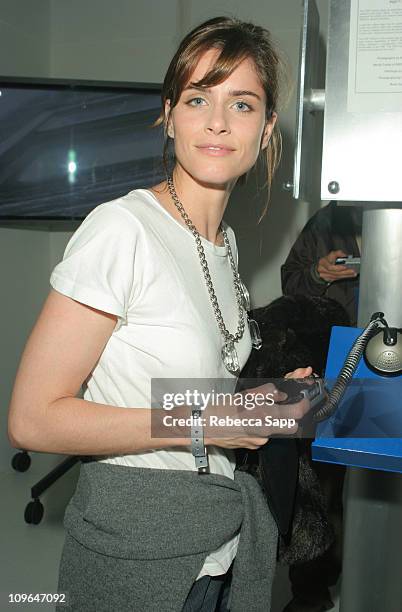 Amanda Peet with PSP during Sony Computer Entertainment America Brings Art to Life at the PSP Factory - Inside at Hollywood Center Studios in...