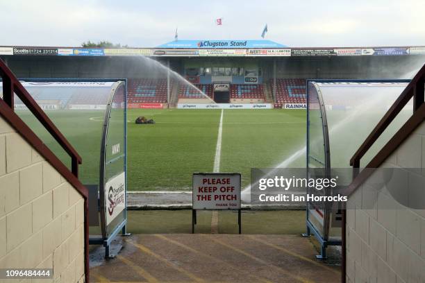 Sprinkler waters the pitch before the Sky Bet League One match between Scunthorpe United and Sunderland at Glanford Park on January 19, 2019 in...