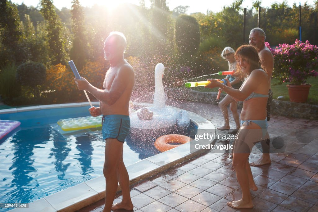 Senior Pool Fun Seniors Pool Fun Socializing High-Res Stock Photo - Getty Images