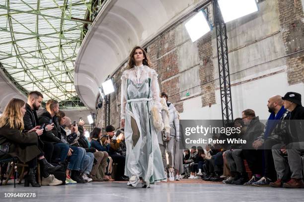 Model walks the runway during the Sacai Menswear Fall/Winter 2019-2020 show as part of Paris Fashion Week on January 19, 2019 in Paris, France.