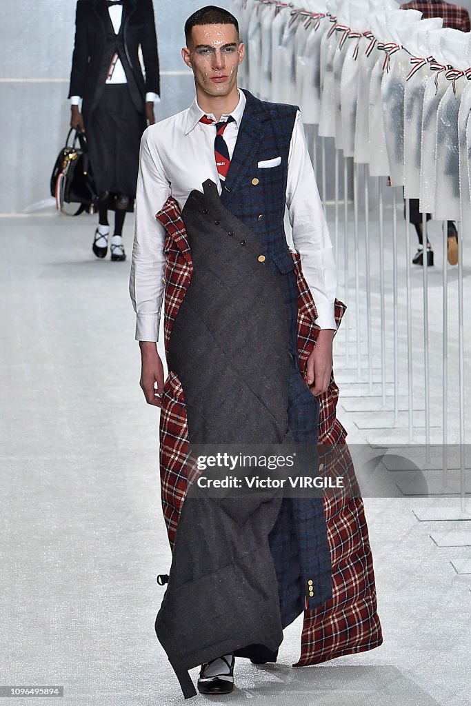 A model walks the runway during the Thom Browne Menswear Fall/Winter ...