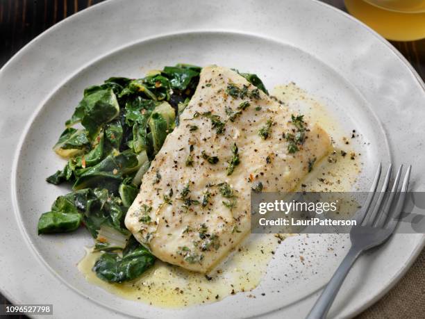 butter poached halibut with swiss chard - halibut stock pictures, royalty-free photos & images