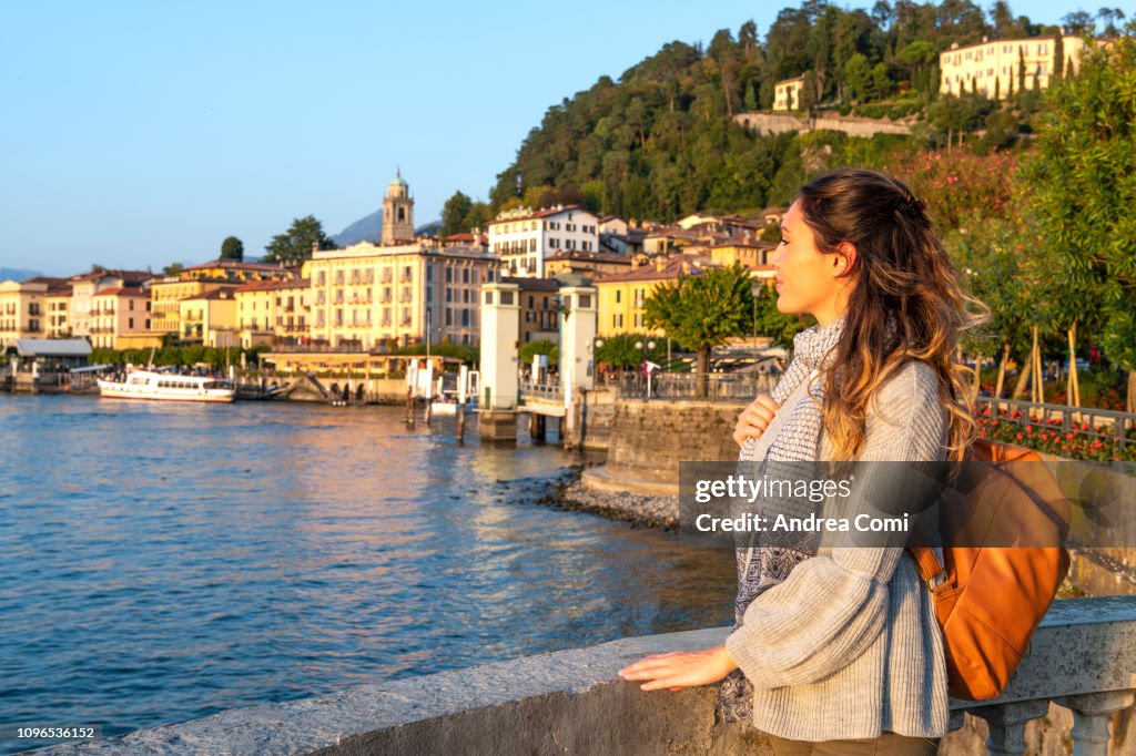 A Young woman admiring the sunset from Bellagio village