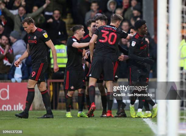 Sunderland players celebrate the opening goal scored by Josh Maja during the Sky Bet League One match between Scunthorpe United and Sunderland at...