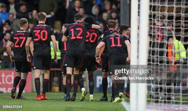 Sunderland players celebrate the opening goal during the Sky Bet League One match between Scunthorpe United and Sunderland at Glanford Park on...
