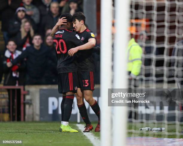 Josh Maja and Luke O'Nien of Sunderland celebrate the first goal during the Sky Bet League One match between Scunthorpe United and Sunderland at...