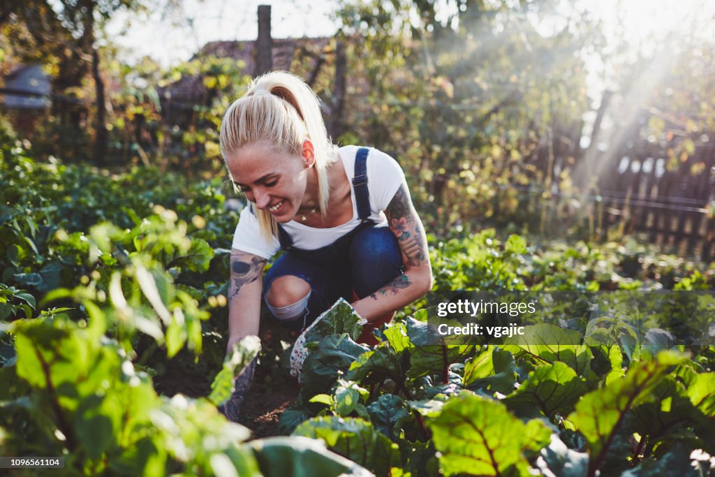 Tattooed Woman Farming