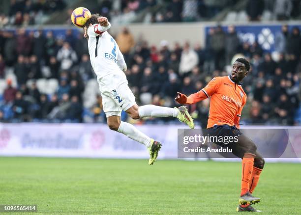 Demba ba of Medipol Basaksehir in action against Egemen Korkmaz of Buyuksehir Belediye Erzurumspor during the Turkish Super Lig football match...