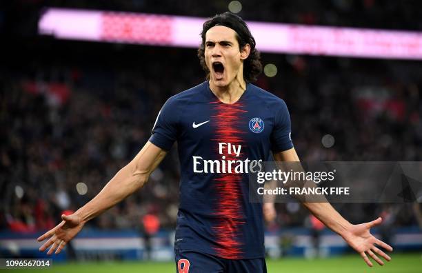 Paris Saint-Germain's Uruguayan forward Edinson Cavani celebrates after scoring a goal during the French L1 football match between Paris...