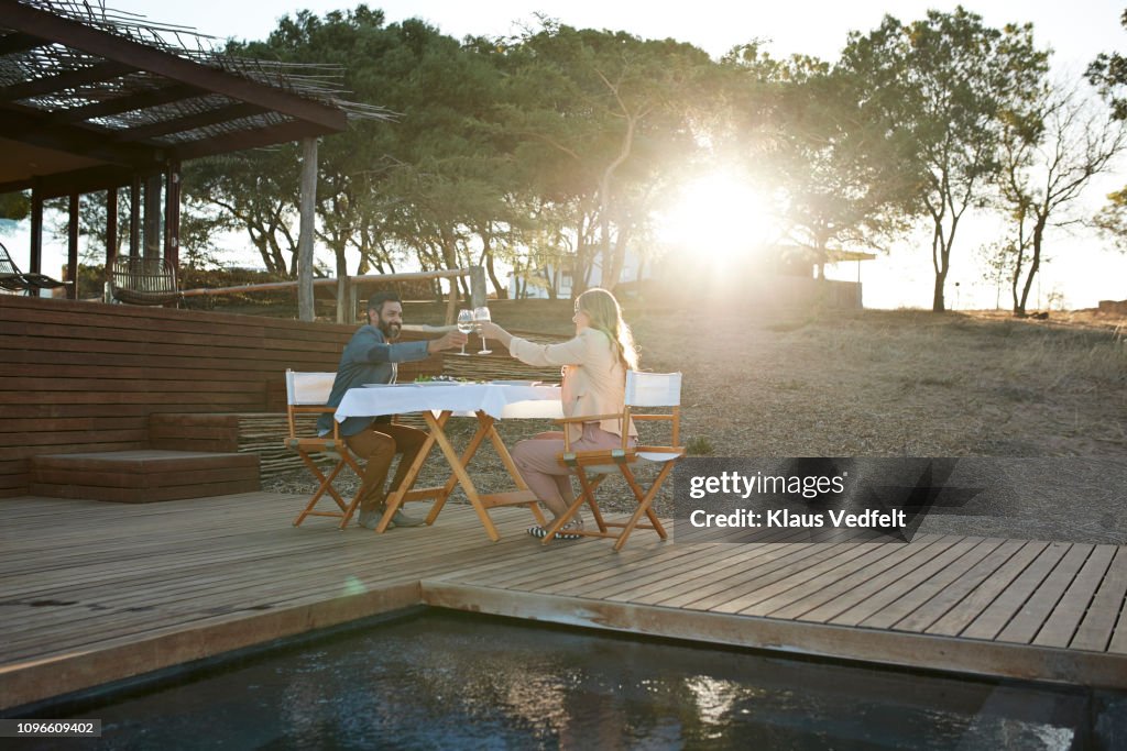 Couple having private romantic dinner in luxury cabin