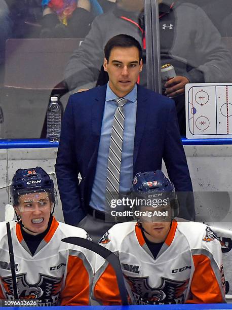 Head coach Eric Wellwood of the Flint Firebirds watches the play develop against the Mississauga Steelheads on January 18, 2019 at Paramount Fine...