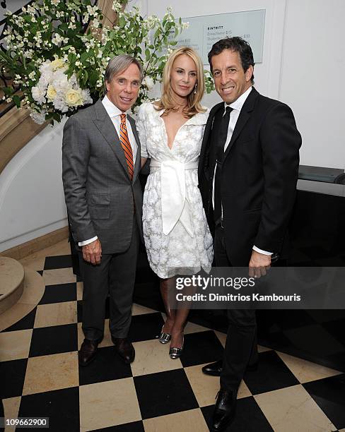 Designer Tommy Hilfiger and Dee Ocleppo with designer Kenneth Cole at their engagement party hosted by Leonard and Evelyn Lauder at Neue Galerie on...