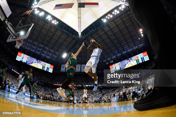 Nassir Little of the North Carolina Tar Heels puts up a shot against Dejan Vasiljevic of the Miami Hurricanes in the second half at Dean Smith Center...