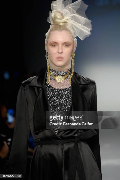 Model walks the runway at the Flying Solo Fashion Show during NYFW February 2019 at Pier 59 on February 9, 2019 in New York City.