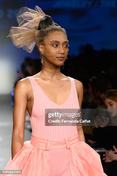 Model walks the runway at the Flying Solo Fashion Show during NYFW February 2019 at Pier 59 on February 9, 2019 in New York City.