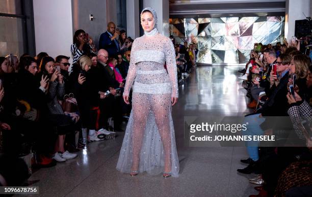 Model Ashley Graham walks the runway at Christian Siriano fashion show during New York Fashion Week on February 9, 2019 in New York City.