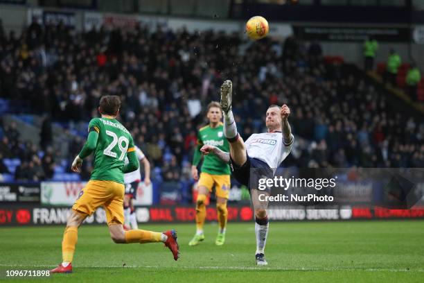 David Wheater of Bolton attempts a clearance during the Sky Bet Championship match between Bolton Wanderers and Preston North End at the Reebok...