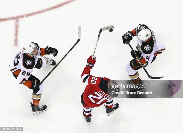 Blake Coleman of the New Jersey Devils skates against Cam Fowler of the Anaheim Ducks at the Prudential Center on January 19, 2019 in Newark, New...