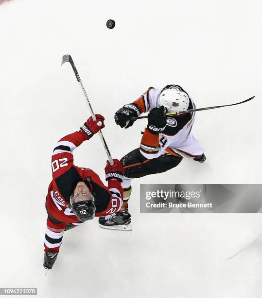 Blake Coleman of the New Jersey Devils skates against Cam Fowler of the Anaheim Ducks at the Prudential Center on January 19, 2019 in Newark, New...