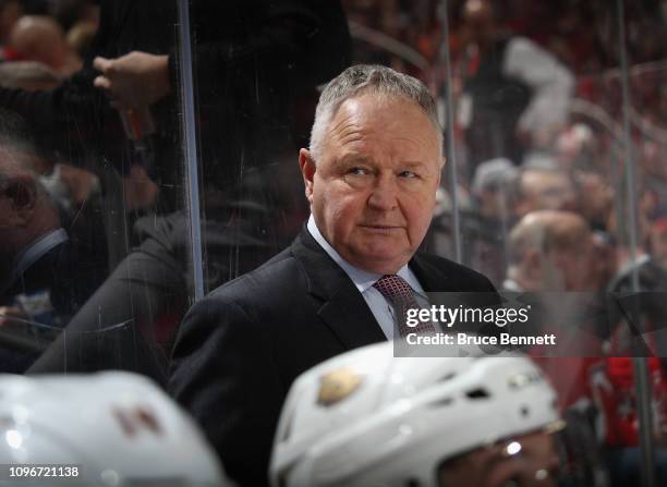 Randy Carlyle of the Anaheim Ducks handles bench duties during the first period against the New Jersey Devils at the Prudential Center on January 19,...