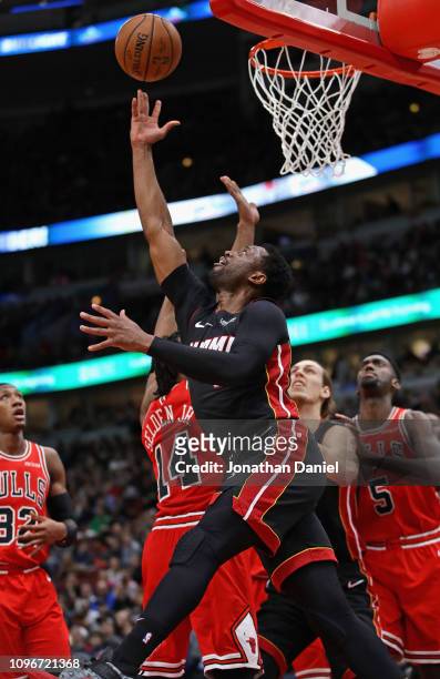 Dwyane Wade of the Miami Heat puts up a shot past Wayne Selden of the Chicago Bulls at United Center on January 19, 2019 in Chicago, Illinois. NOTE...