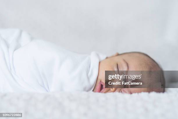 newborn sleeping baby - black newborn stock pictures, royalty-free photos & images
