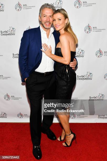 Joanna Krupa and husband, Douglas Nunes attend the Social Compassion in Legislation Hosts "Sunset On Sunset" Event Honoring Animal-Rights Pioneers at...