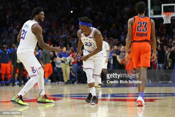 Joel Embiid celebrates with Jimmy Butler of the Philadelphia 76ers after Butler's basket to put the Sixers up by two with 6.9 seconds left in the...