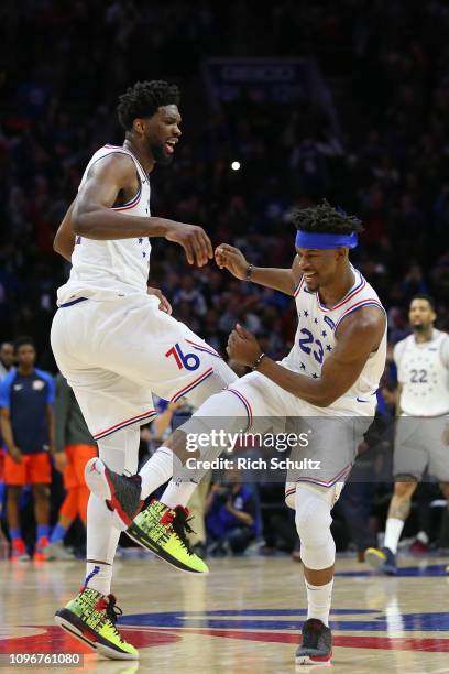 Joel Embiid celebrates with Jimmy Butler of the Philadelphia 76ers after Butler's basket to put the Sixers up by two with 6.9 seconds left in the...