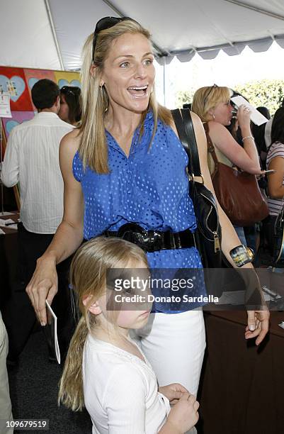 Jamie Tisch and child during 5th Annual John Varvatos Stuart House Benefit Presented by Converse at John Varvatos Boutique in Los Angeles,...
