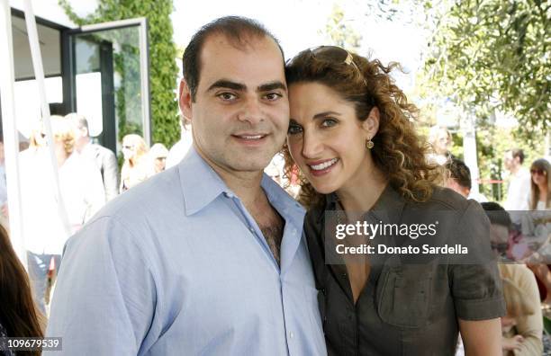 Peter Constantinades and Melina Kanakaredes during 5th Annual John Varvatos Stuart House Benefit Presented by Converse at John Varvatos Boutique in...