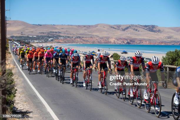 The peleton on the Esplanade at Aldinga beach during Stage 6 from McLaren Vale to Willunga Hill of the Santos Tour Down Under on January 20, 2019 in...