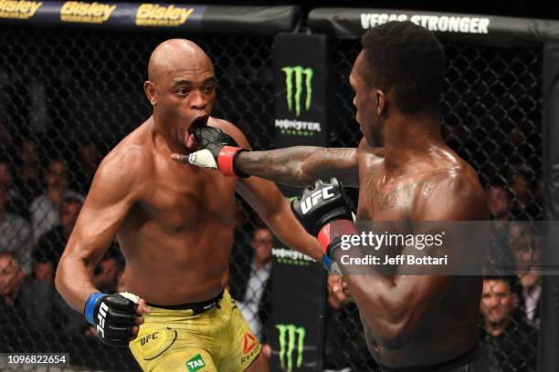 Israel Adesanya of New Zealand punches Anderson Silva of Brazil in their middleweight bout during the UFC 234 at Rod Laver Arena on February 10, 2019...