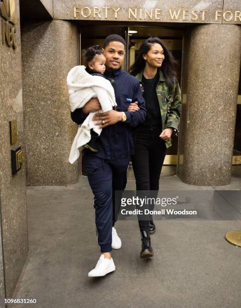 Giants Wide Receiver Sterling Shepard, model and wife Chanel Iman, and daughter Cali Clay Shepard leave the Christian Siriano show during New York...