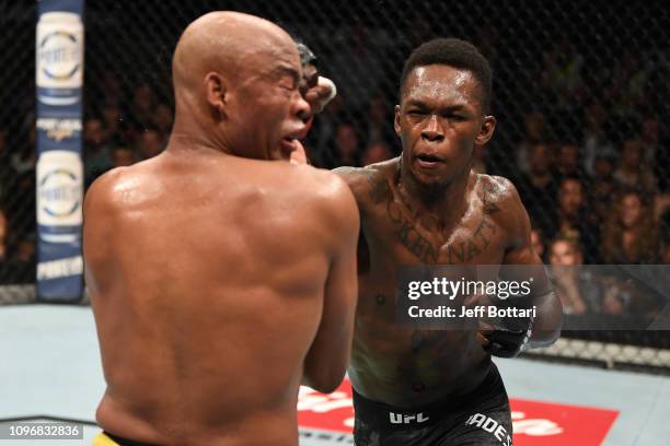 Israel Adesanya of New Zealand punches Anderson Silva of Brazil in their middleweight bout during the UFC 234 at Rod Laver Arena on February 10, 2019...