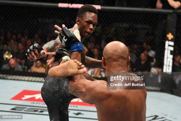 Israel Adesanya of New Zealand kicks Anderson Silva of Brazil in their middleweight bout during the UFC 234 at Rod Laver Arena on February 10, 2019...
