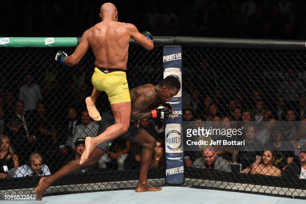 Anderson Silva of Brazil attempts to knee Israel Adesanya of New Zealand in their middleweight bout during the UFC 234 at Rod Laver Arena on February...