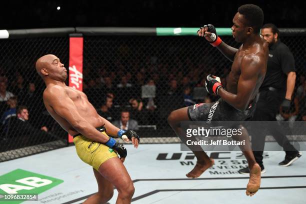 Israel Adesanya of New Zealand attempts to kick Anderson Silva of Brazil in their middleweight bout during the UFC 234 at Rod Laver Arena on February...